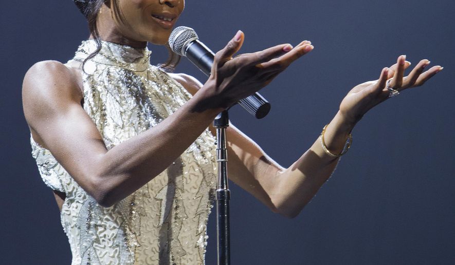 In this image released by Lifetime, Yaya DaCosta stars as Whitney Houston in the Lifetime Original Movie, "Whitney," premiering Saturday, Jan. 17, 2015 at 8pm ET/PT on Lifetime. (AP Photo/Lifetime, Jack Zeman)
