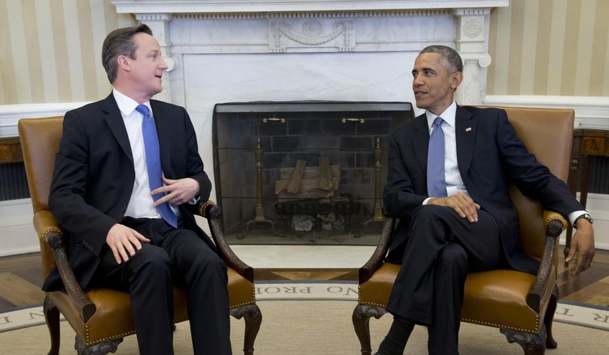 President Barack Obama meets with British Prime Minister David Cameron, Friday, Jan. 16, 2015, in the Oval Office of the White House in Washington. Growing fears about the specter of terrorism in Europe and the West are lending themselves to a sense of trans-Atlantic solidarity as President Barack Obama and British Prime Minister David Cameron met at the White House. (AP Photo/Carolyn Kaster)