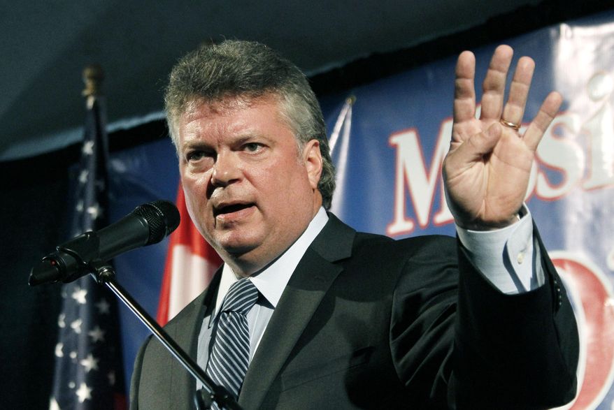 FILE - In this Oct. 31, 2012 file photo, Mississippi Attorney General Jim Hood speaks before the Mississippi Economic Council's annual Hobnob in Jackson. Hood says a suit against him by Google should be dismissed. Hood argues the Internet search giant’s assertion that it is protected by federal law fails to invalidate state laws under which he’s investigating, and that Google has jumped the gun because Hood doesn’t know what information his inquiry will yield. Hood also denies his investigation will chill Google’s speech rights. A hearing in the case is set for Feb. 13, 2015 in Jackson before U.S. District Judge Henry T. Wingate. (AP Photo/Rogelio V. Solis)