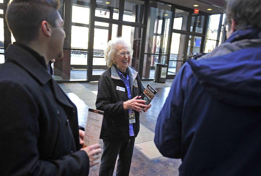 Rose Lee Maphis greets visitors Bruno Ferrari, left, and Marcus Haug at the Country Music Hall of Fame and Museum on Jan. 5, 2015 in Nashville, Tenn. During the 1950s and 1960s, Rose Lee Maphis and her husband, Joe, ranked as one of show business's most successful husband-and-wife duos — known by many as "Mr. and Mrs. Country Music." (AP Photo/The Tennessean, Jae S. Lee ) NO SALES