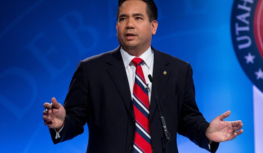 FILE - In this Oct. 1, 2014 file photo, Sean Reyes speaks during his debate with Charles Stormont as the Utah Attorney General hopefuls debate at KBYU Studios in Provo, Utah. Reyes says he secretly traveled to South America to play a role in a sex-trafficking sting operation in order to help fight the crime before victims end up in Utah. Reyes spoke this week about the trip to Colombia in October, where he pretended to be a bodyguard and Spanish-speaking translator for businessmen seeking children for a sex party. (AP Photo/The Salt Lake Tribune, Trent Nelson, Pool)