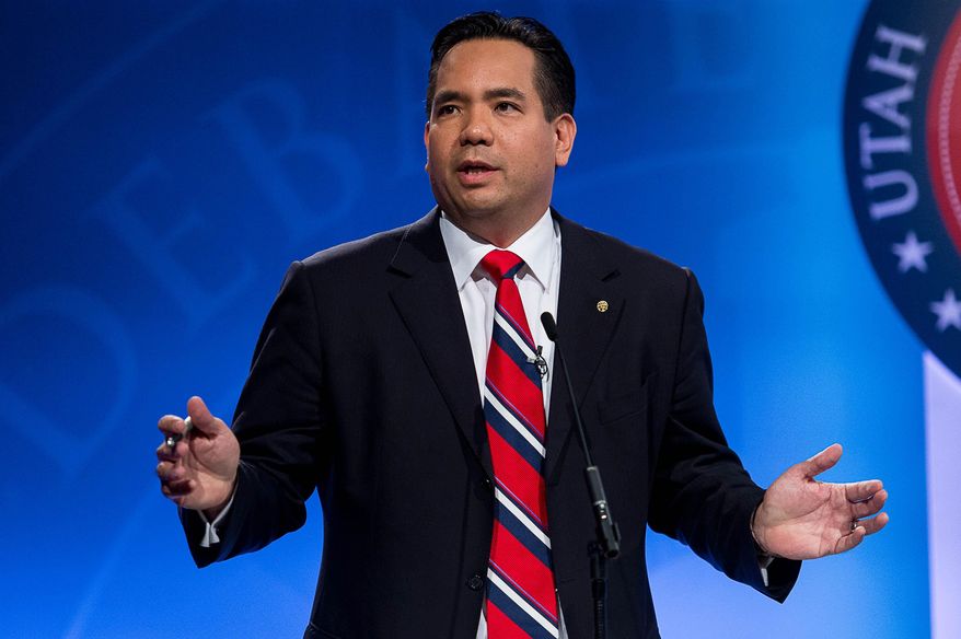 FILE - In this Oct. 1, 2014 file photo, Sean Reyes speaks during his debate with Charles Stormont as the Utah Attorney General hopefuls debate at KBYU Studios in Provo, Utah. Reyes says he secretly traveled to South America to play a role in a sex-trafficking sting operation in order to help fight the crime before victims end up in Utah. Reyes spoke this week about the trip to Colombia in October, where he pretended to be a bodyguard and Spanish-speaking translator for businessmen seeking children for a sex party. (AP Photo/The Salt Lake Tribune, Trent Nelson, Pool)