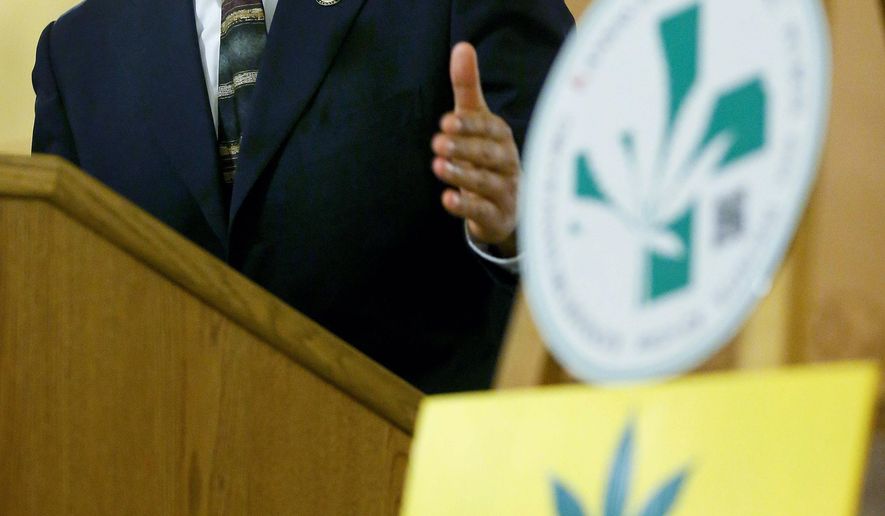 Sen. David Haley, D-Kansas City, speaks to supporters of medical marijuana during a rally on Thursday Jan. 15, 2015, at the statehouse, in Topeka, Kan. Both Haley and Rep. Gail Finney, D-Wichita, have filed legislation for medical marijuana. (AP Photo/The Topeka Capital Journal, Chris Neal)