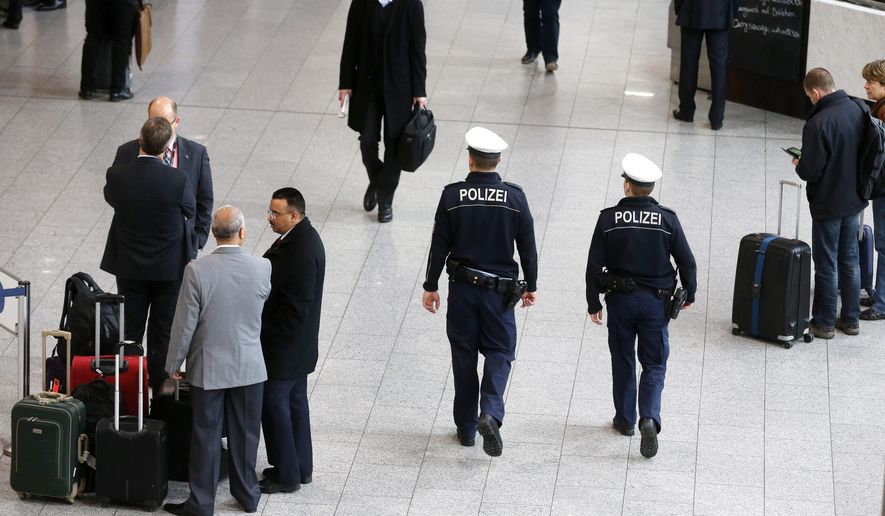 German police officers patrol in a terminal at the airport in Frankfurt, Germany, Monday, Jan. 19, 2015. (AP Photo/Michael Probst) ** FILE **