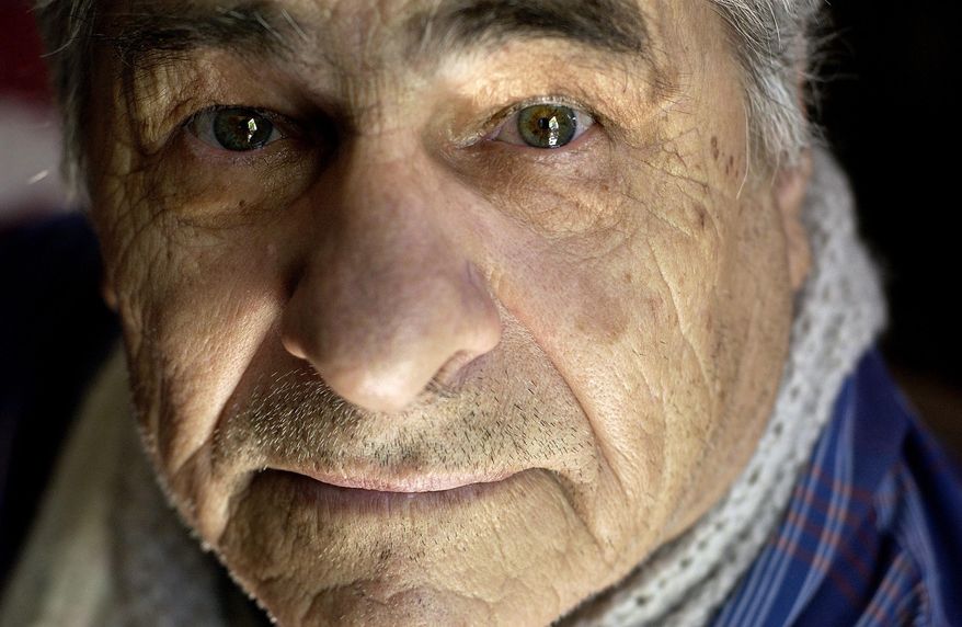 FILE - In this June 1, 2005, file photo, Reies Lopez Tijerina, 79, a land grant activist who led a 1967 raid on the Rio Arriba Courthouse in New Mexico, poses for a photo in Albuquerque, N.M. Lopez Tijerina, a champion of Chicanos' land-rights claims and the leader of a group that raided a northern New Mexico courthouse nearly 50 years ago, has died, Monday, Jan. 19, 2015, at age 88. Family representative Estela Reyes-Lopez said the prominent activist died Monday at an El Paso, Texas, hospital, of natural cases. Nephew Luis Tijerina also confirmed the death. (AP Photo/The Albuquerque Tribune, Stacia Spragg, File)
