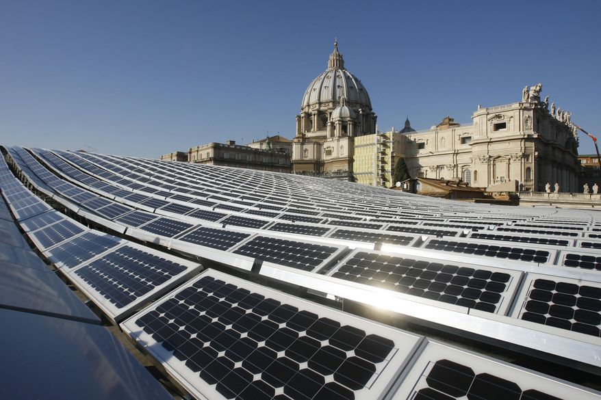 This Wednesday, Nov. 26, 2008, file photo, shows solar panels on the roof of the Paul VI Hall, at the Vatican. Pope Benedict XVI was dubbed "the Green Pope" for his frequent calls to stop ecological devastation and his efforts to bring solar power to the Vatican city-state. "Can we remain indifferent before the problems associated with such realities as climate change?"’ Benedict said in 2010. (AP Photo/Alessandra Tarantino)