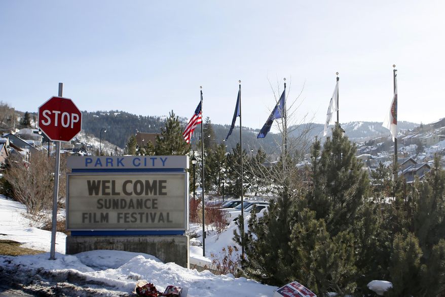FILE - In this Jan. 16, 2014 file photo, a sign outside of the Main Street area welcomes people to the 2014 Sundance Film Festival in Park City, Utah. Celebrating its 31st year, the festival has steadily outgrown its indie-film roots to showcase emerging and established talent in art, music, television, film and new media. The 2015 Sundance Film Festival runs Jan. 22 through Feb. 1, 2015. (Photo by Danny Moloshok/Invision/AP, File)