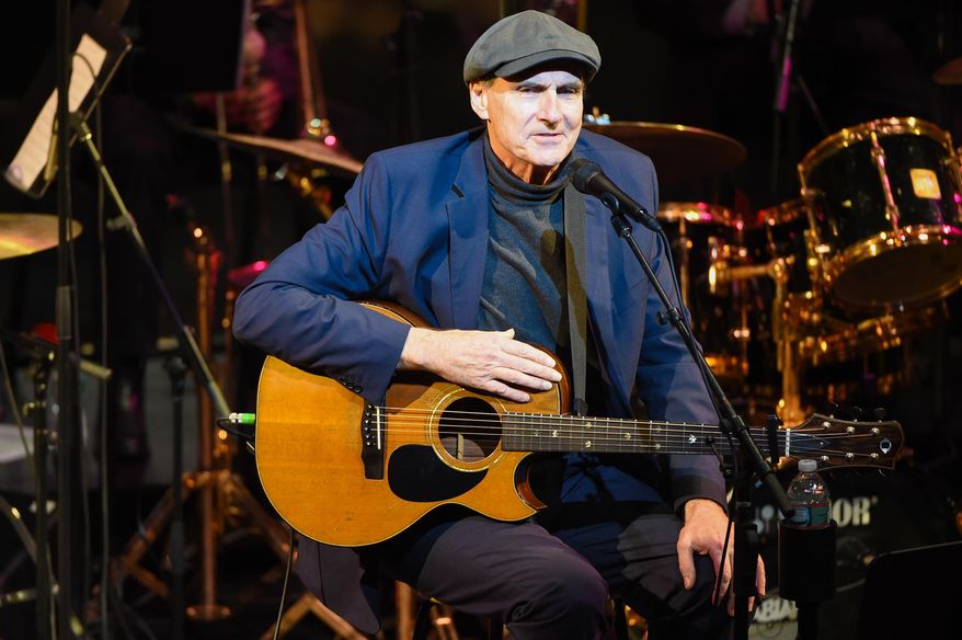James Taylor performs at the Nearness of You concert at Frederick P. Rose Hall, Jazz at Lincoln Center on Tuesday, Jan. 20, 2015, in New York. (Photo by Scott Roth/Invision/AP)