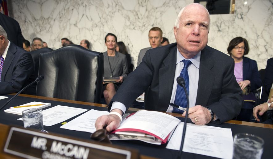 Senate Armed Services Committee Chairman Sen. John McCain, R-Ariz., bangs the gavel to start the committee&#39;s hearing to examine global challenges and U.S. national security strategy, Wednesday, Jan. 21, 2015, on Capitol Hill in Washington. (AP Photo/Cliff Owen)