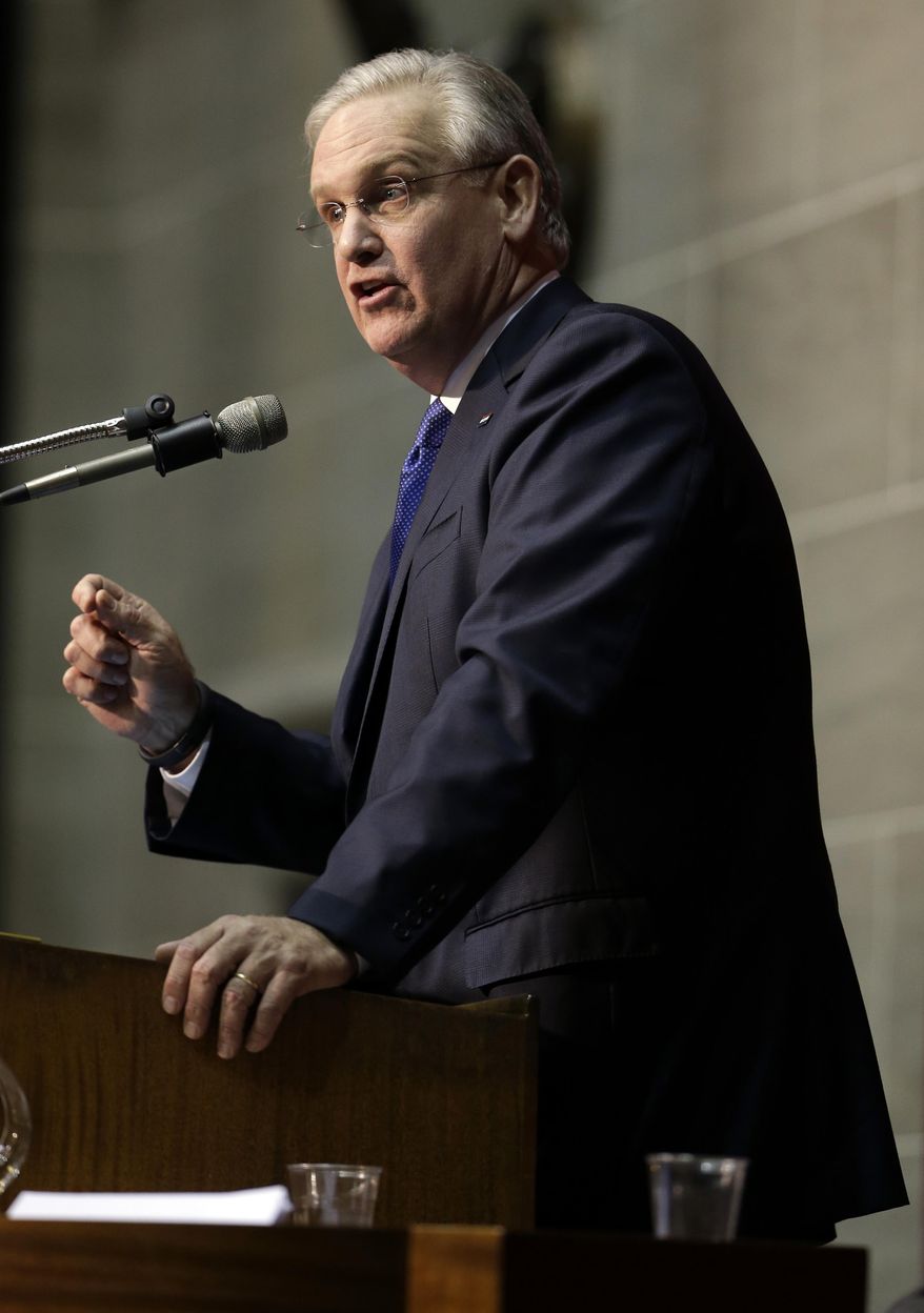 Missouri Gov. Jay Nixon delivers the annual State of the State address to a joint session of the House and Senate, Wednesday, Jan. 21, 2015, in Jefferson City, Mo. (AP Photo/Jeff Roberson)