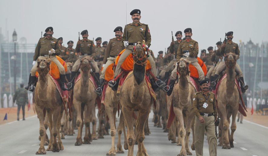 Indian soldiers rehearse for the Republic Day parade in New Delhi, where President Obama will be the &quot;chief guest.&quot; The unprecedented invitation to the U.S. president is part of Indian Prime Minister Naredra Modi&#39;s aggressive diplomacy. (Associated Press)