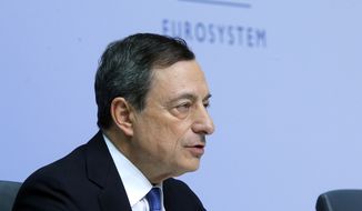 President of European Central Bank Mario Draghi speaks during a news conference in Frankfurt, Germany, Thursday, Jan. 22, 2015, following a meeting of the ECB governing council. (AP Photo/Michael Probst)