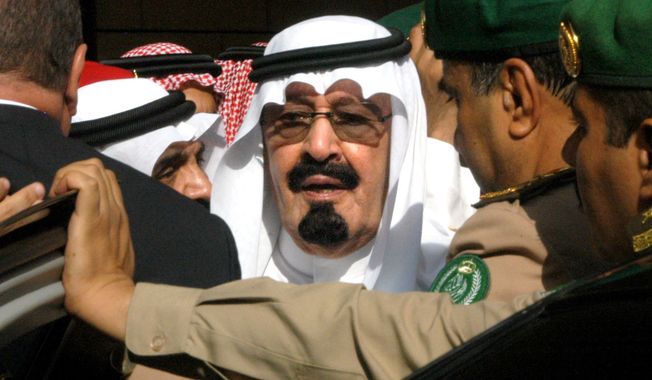 FILE - In this Tuesday, Aug. 2, 2005 file photo, Saudi Arabia&#x27;s new King Abdullah leaves after special prayers for late King Fahd at Riyadh, Saudi Arabia&#x27;s Turk bin Abdullah mosque. On early Friday, Jan. 23, 2015, Saudi state TV reported King Abdullah died at the age of 90. (AP Photo)
