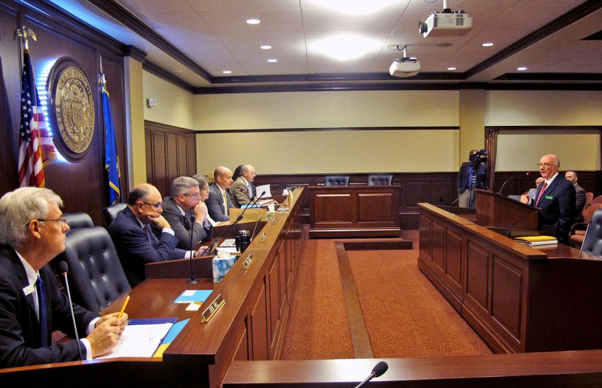 Coeur d&#x27;Alene Tribe lobbyist Bill Roden presents his bill in front of the Senate State Affairs Committee on Friday, Jan. 23, 2015, in Boise, Idaho. Roden is requesting lawmakers repeal the law that permits instant horse racing in Idaho. (AP Photo/Kimberlee Kruesi)