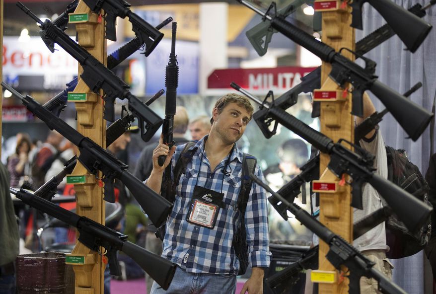 Gun dealers had been steeling for a potential dip after the election of Donald Trump, who proudly championed gun rights during his 2016 campaign against Democrat Hillary Clinton and touted the earliest-ever presidential endorsement from the National Rifle Association. (Associated Press/File)