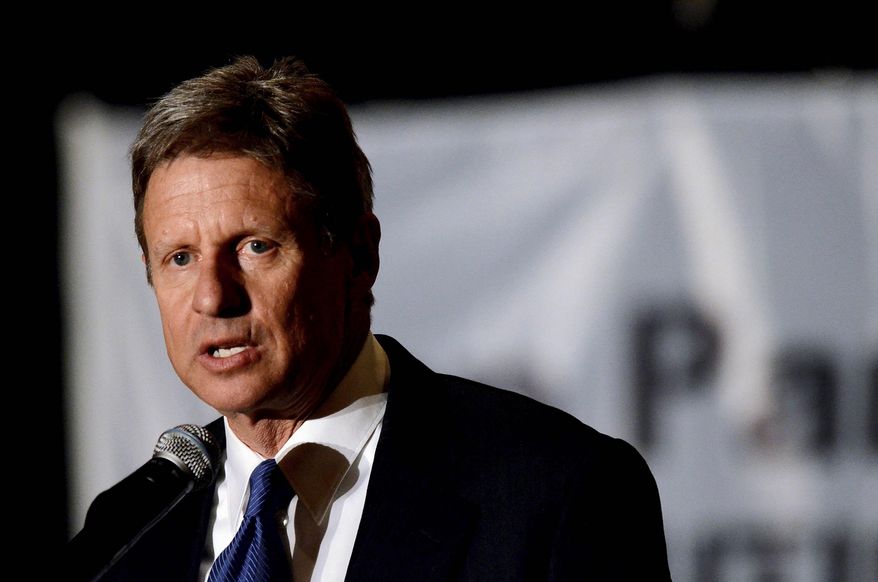 Gary Johnson, who ran for the White house in 2012 as the Libertarian Party candidate, now leads a national movement to allow third-party candidates in national presidential debates. (Associated Press) ** FILE **