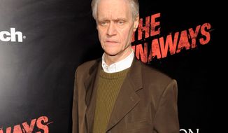 FILE - In this March 11, 2010 file photo, rock manager and producer Kim Fowley arrives at the premiere of the film &quot;The Runaways&quot; in Los Angeles. Fowley, the colorful rock musician who produced for The Runaways and co-wrote songs for Kiss and Alice Cooper, has died after a long battle with bladder cancer, his wife said Friday, Jan. 16, 2015. He was 75. (AP Photo/Chris Pizzello, File)