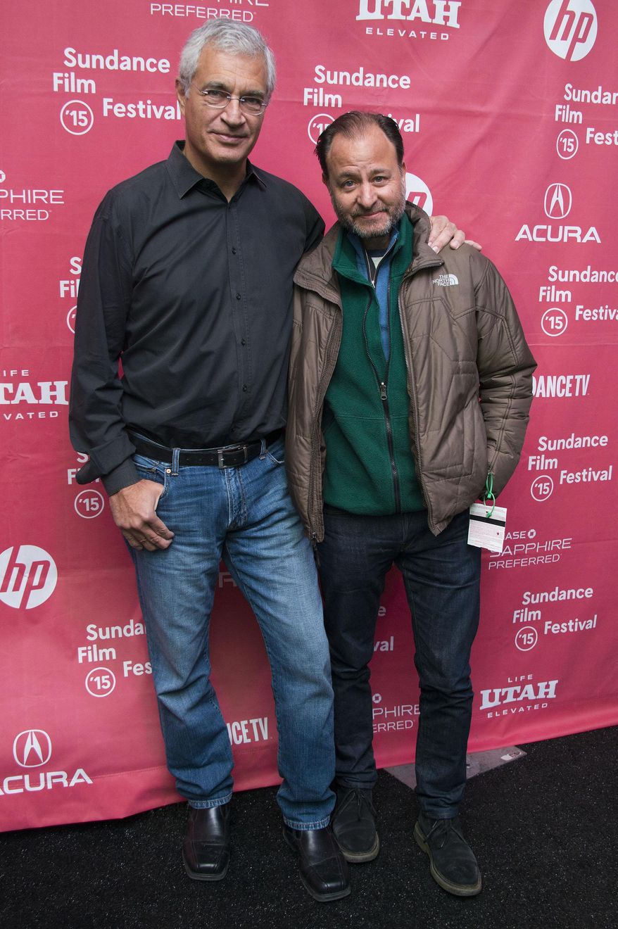 From left, Director Louie Psihoyos and Fisher Stevens attend the premiere of "Racing Extinction" during the 2015 Sundance Film Festival on Saturday, Jan. 24, 2015, in Park City, Utah. (Photo by Arthur Mola/Invision/AP)