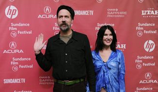 Krist Novoselic, left, former bass player of Nirvana, and his wife Darbury Stenderu arrive at the premiere of the documentary film &amp;quot;Kurt Cobain: Montage of Heck,&amp;quot; at The MARC Theatre during the 2015 Sundance Film Festival on Saturday, Jan. 24, 2015, in Park City, Utah. (Photo by Chris Pizzello/Invision/AP)