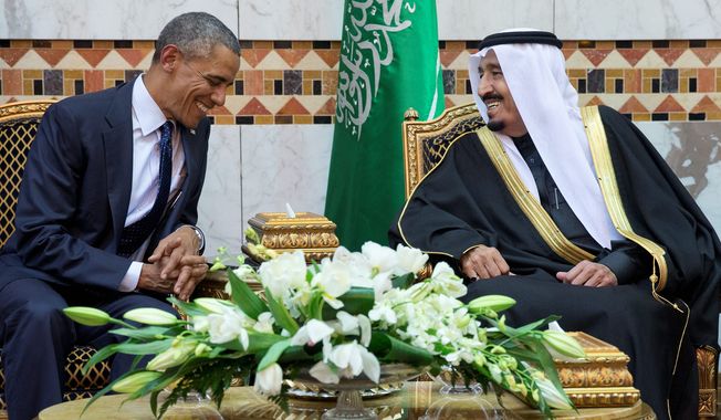 President Obama meets new Saudi Arabian King Salman bin Abdul Aziz in Riyadh, Saudi Arabia, Tuesday, where he and the and first lady have come to expresses their condolences on the death of the late Saudi Arabian King Abdullah bin Abdulaziz al-Saud. Mr. Obama was mum on human rights issues in the country. (Associated Press)