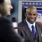 NFL Hall of Famer Deion Sanders laughs on the NFL Network set before an NFL football game between the Jacksonville Jaguars and the Tennessee Titans Thursday, Dec. 18, 2014, in Jacksonville, Fla. (AP Photo/Chris O&#39;Meara) 