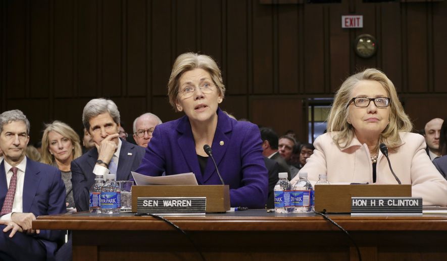 Sen. Elizabeth Warren (center), Massachusetts Democrat, accompanied by Secretary of State Hillary Rodham Clinton (right), make statements introducing Senate Foreign Relations Chairman John Kerry (seated at left), Massachusetts Democrat, to the committee during his Jan. 24, 2013, confirmation hearing to become secretary of state, replacing Clinton, on Capitol Hill in Washington. (Associated Press) **FILE**
