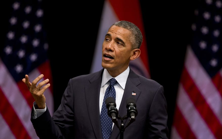 President Obama speaks at the Siri Fort Auditorium, a government-run event center, in New Delhi, India, Tuesday, Jan. 27, 2015. Obama gently nudged India Tuesday to fulfill its constitution's pledge to uphold the "dignity of the individual," drawing on his own experience as a minority in the United States as he closed out a three-day visit to New Delhi. (AP Photo/Saurabh Das)