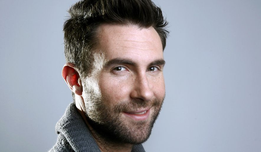 This Feb. 20, 2012, file photo shows Maroon 5 frontman Adam Levine in New York. (AP Photo/Carlo Allegri, File)