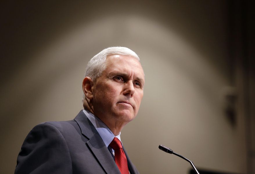 FILE - In this Tuesday, Jan. 27, 2015 file photo, Indiana Gov. Mike Pence announces that the Centers for Medicaid and Medicare Services has approved the state's waiver request for the plan his administration calls HIP 2.0, during a speech in Indianapolis. Pence said Wednesday that he regrets the "confusion" caused by a memo about a planned state-run news website and will scrap the project if it doesn't "respect the role of a free and independent press." (AP Photo/Michael Conroy)