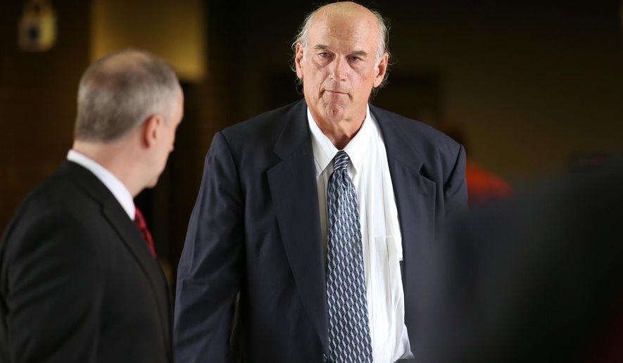 Former Navy SEAL and Minnesota Gov. Jesse Ventura (right) walks into Warren E. Burger Federal Building during the first day of jury selection in a defamation lawsuit in St. Paul, Minn., on July 8, 2015. Ventura, who won $1.8 million in the lawsuit against the estate of the late Chris Kyle, says he won’t see the &quot;American Sniper&quot; film partly because Kyle is no hero to him. (Associated Press/The Star Tribune, Elizabeth Flores) **FILE**