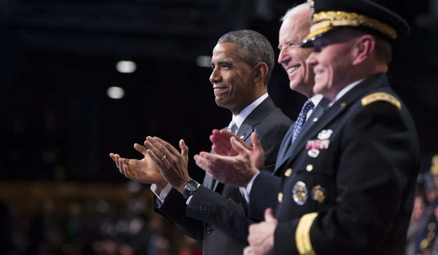 President Barack Obama, left, Vice President Joe Biden, center, and Chairman of the Joint Chiefs of Staff Gen. Martin Dempsey applaud outgoing Secretary of Defense Chuck Hagel during a celebration in honor of Mr. Hagel&#39;s service, on Wednesday, Jan. 28, 2015, in Fort Myer, Va. Mr. Obama, Vice President Joe Biden and top military brass praised Mr. Hagel at a farewell ceremony at Joint Base Fort Myer-Henderson Hall. Mr. Obama said the country is grateful for military progress on Hagel&#39;s watch.(AP Photo/Evan Vucci)  