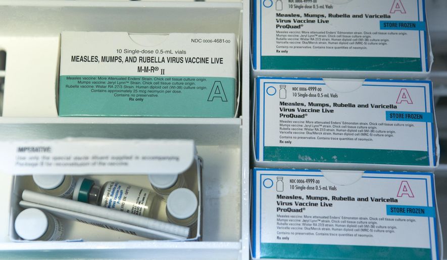 Boxes of single-doses vials of the measles-mumps-rubella virus vaccine live, or MMR vaccine and ProQuad vaccine are kept frozen inside a freezer at the practice of Dr. Charles Goodman in Northridge, Calif., Thursday, Jan. 29, 2015. Some doctors are adamant about not accepting patients who don&#39;t believe in vaccinations, with some saying they don&#39;t want to be responsible for someone&#39;s death from an illness that was preventable. (AP Photo/Damian Dovarganes)