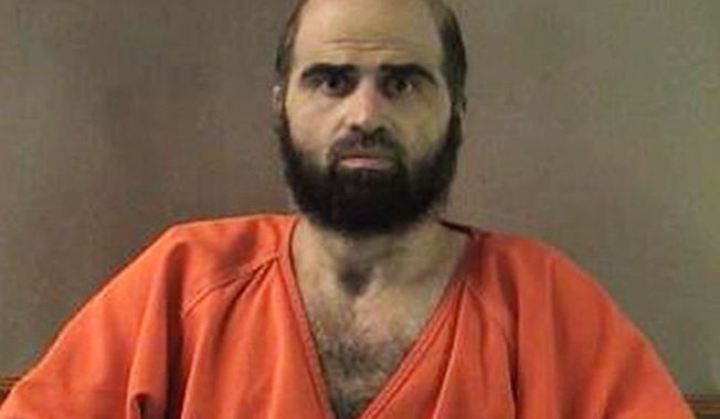 Former Army psychiatrist Maj. Nidal Hasan killed 13 people in a 2009 shooting spree at a Texas Army base. He is on military death row. (AP Photo/Bell County Sheriff&#x27;s Department, File) ** FILE **