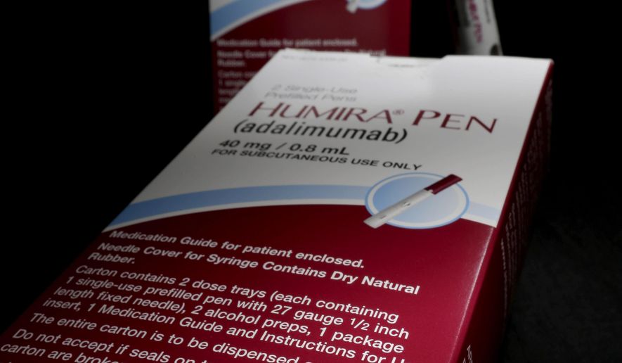 FILE - This Friday, July 18, 2014, file photo, shows AbbVie's signature drug Humira, in Houston. Drugmaker Abbvie posted better-than-expected fourth quarter earnings Friday, Jan. 30, 2015, on double-digit growth of its blockbuster anti-inflammatory drug Humira. (AP Photo/David J. Phillip, File)