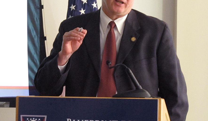 State Budget Director Tim Keen discusses details of Ohio Gov. John Kasich's proposed two-year, $72 billion state budget that includes a $500 million net tax cut, on Monday, Feb. 2, 2015, in Columbus, Ohio. (AP Photo/Andrew Welsh-Huggins)