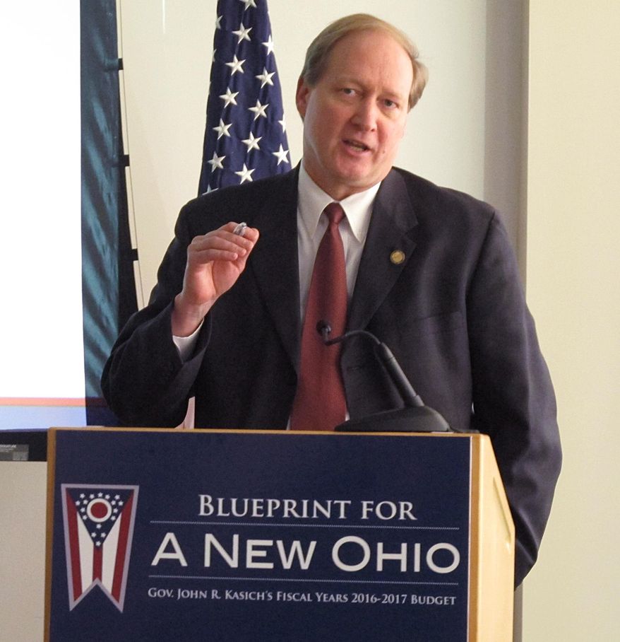 State Budget Director Tim Keen discusses details of Ohio Gov. John Kasich's proposed two-year, $72 billion state budget that includes a $500 million net tax cut, on Monday, Feb. 2, 2015, in Columbus, Ohio. (AP Photo/Andrew Welsh-Huggins)