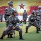 Chinese People’s Liberation Army cadets take part in a bayonet drills at the PLA’s Armoured Forces Engineering Academy Base, on the outskirts of Beijing. (Associated Press)