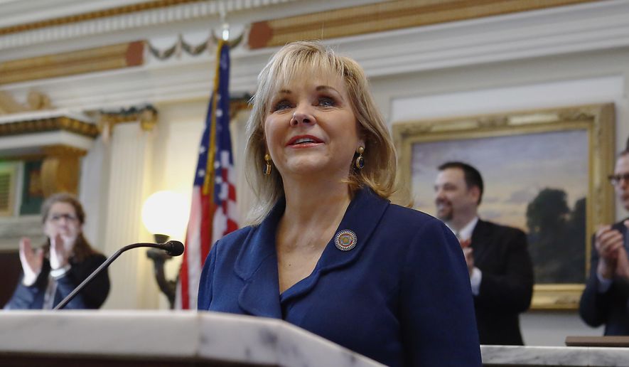 Oklahoma Gov. Mary Fallin smiles before delivering the State of the State address in Oklahoma City, Monday, Feb. 2, 2015. (AP Photo/Alonzo Adams) ** FILE **
