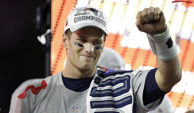New England Patriots quarterback Tom Brady (12) celebrates after the NFL Super Bowl XLIX football game against the Seattle Seahawks Sunday, Feb. 1, 2015, in Glendale, Ariz. The Patriots won the game 28-24.(AP Photo/Ben Margot) 