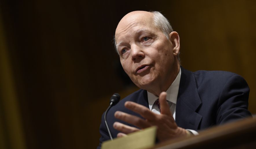 IRS Commissioner John Koskinen confirmed Tuesday that illegal immigrants granted amnesty from deportation under President Obama&#39;s new policies would be able to get extra refunds from the IRS for money they earned while working illegally, as long as they filed returns during those years. (Associated Press)