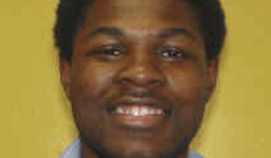 This undated photo provided by the Ohio Department of Rehabilitation and Correction shows Brandon Moore. Moore was tried as an adult and convicted by a jury in the 2001 armed kidnapping, robbery and gang rape of a 22-year-old Youngstown State University student. Lawyers for Moore, a convicted rapist who claims a 112-year prison sentence imposed when he was 15 years old violates his constitutional rights want the Ohio Supreme Court to overturn the sentence. (AP Photo/Ohio Department of Rehabilitation and Correction)
