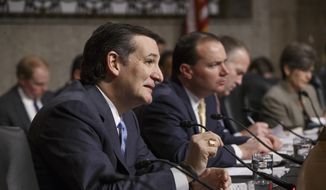 Senate Armed Services Committee member Sen. Ted Cruz, R-Texas, left, joined by Sen. Mike Lee, R-Utah, center, poses questions to Ashton Carter, President Barack Obama&#39;s choice to be defense secretary, as he goes before the committee for confirmation to replace Chuck Hagel as Pentagon chief, Wednesday, Feb. 4, 2015, on Capitol Hill in Washington. (AP Photo/J. Scott Applewhite) ** FILE **