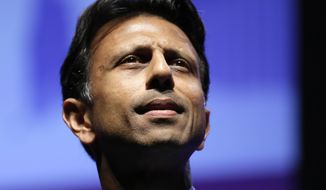 Louisiana Gov. Bobby Jindal pauses while speaking in Ames, Iowa, in this Aug. 9, 2014, file photo. (AP Photo/Charlie Neibergall, File)