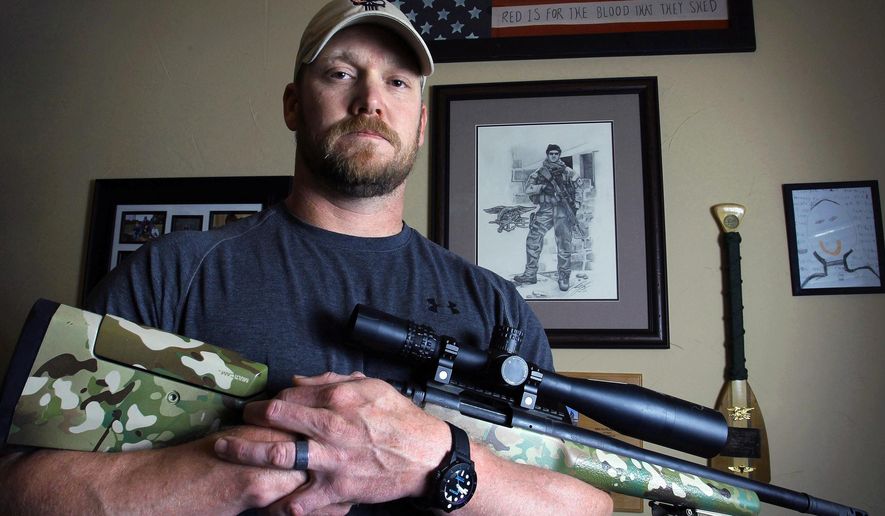 The late Chris Kyle, a former Navy SEAL and author of the book “American Sniper,” poses in Midlothian, Texas, April 6, 2012. (Associated Press) ** FILE **