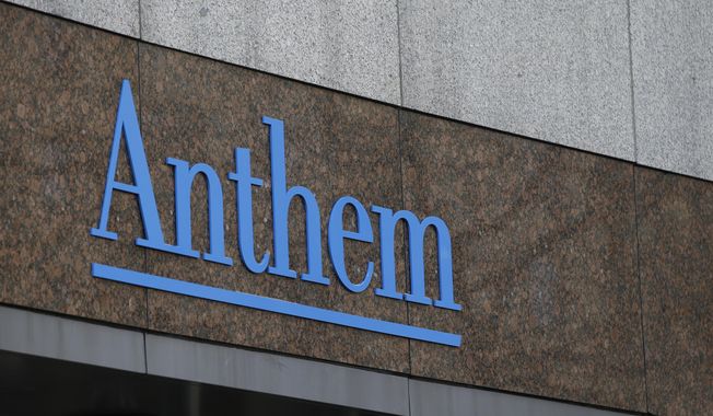 This Wednesday, Dec. 3, 2014, file photo shows the Anthem logo at the company's corporate headquarters in Indianapolis. Health insurer Anthem said in a statement Wednesday Feb. 4, 2015, that hackers infiltrated its computer network and accessed a swathe of personal information about current and former customers including their incomes and street addresses. (AP Photo/Darron Cummings, File)
