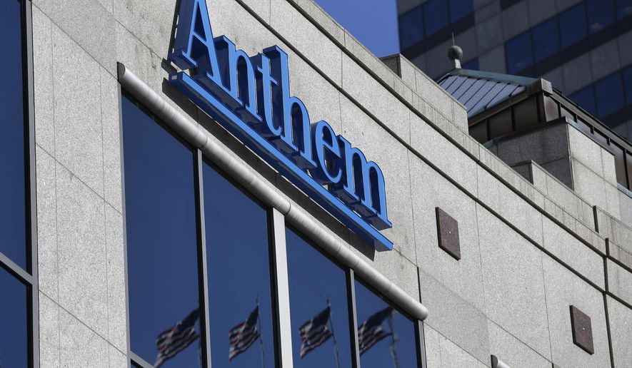 The Anthem logo hangs at the health insurer&#39;s corporate headquarters in Indianapolis, Thursday, Feb. 5, 2015. Hackers broke into the company&#39;s database storing information for about 80 million people in an attack bound to stoke fears many Americans have about the privacy of their most sensitive information. (AP Photo/Michael Conroy)