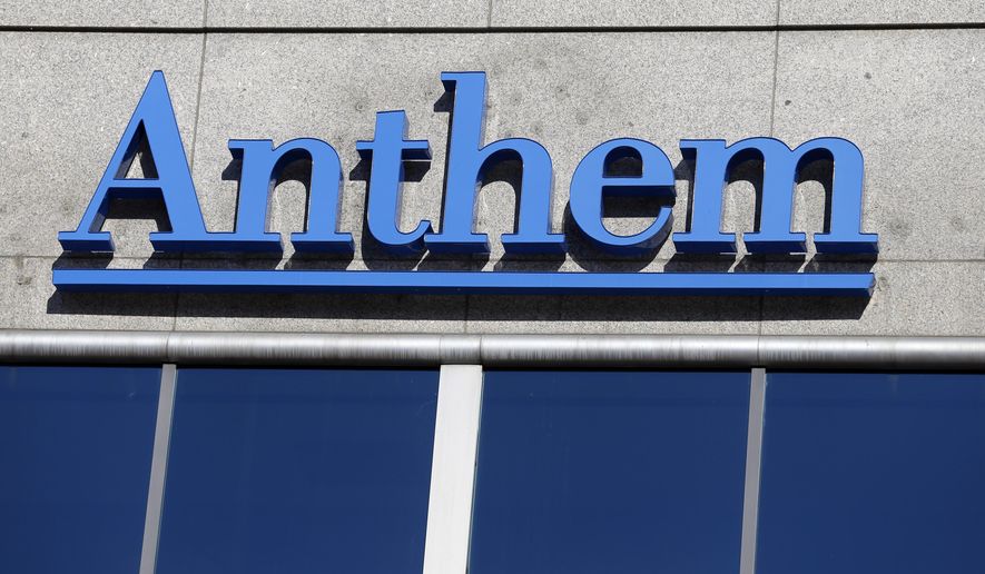 The Anthem logo hangs at the health insurer&#39;s corporate headquarters in Indianapolis, Thursday, Feb. 5, 2015. Hackers broke into the company&#39;s database storing information for about 80 million people in an attack bound to stoke fears many Americans have about the privacy of their most sensitive information. (AP Photo/Michael Conroy) ** FILE **