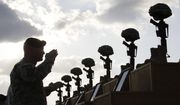 In this Nov. 10, 2009, photo, soldiers salute as they honor victims of the Fort Hood shooting at a memorial service at Fort Hood, Texas. The Army said in a letter addressed to Congress on Friday, Feb. 6, 2015 that the victims of the 2009 shooting that left 13 dead and more than 30 wounded will receive the Purple Hearts many have said they deserve. (AP Photo/Donna McWilliam) **FILE**