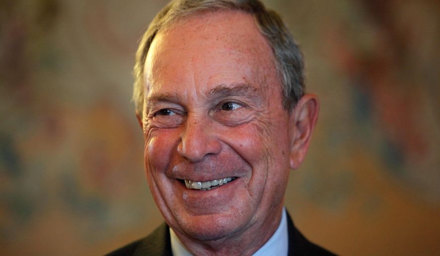 In this Sept. 16, 2014, file photo, former New York Mayor Michael Bloomberg smiles prior to be conferred with the Chevalier de la Legion d&#39;Honneur by France&#39;s Foreign minister Laurent Fabius, at the Quai d&#39;Orsay, in Paris. (AP Photo/Thibault Camus, File)