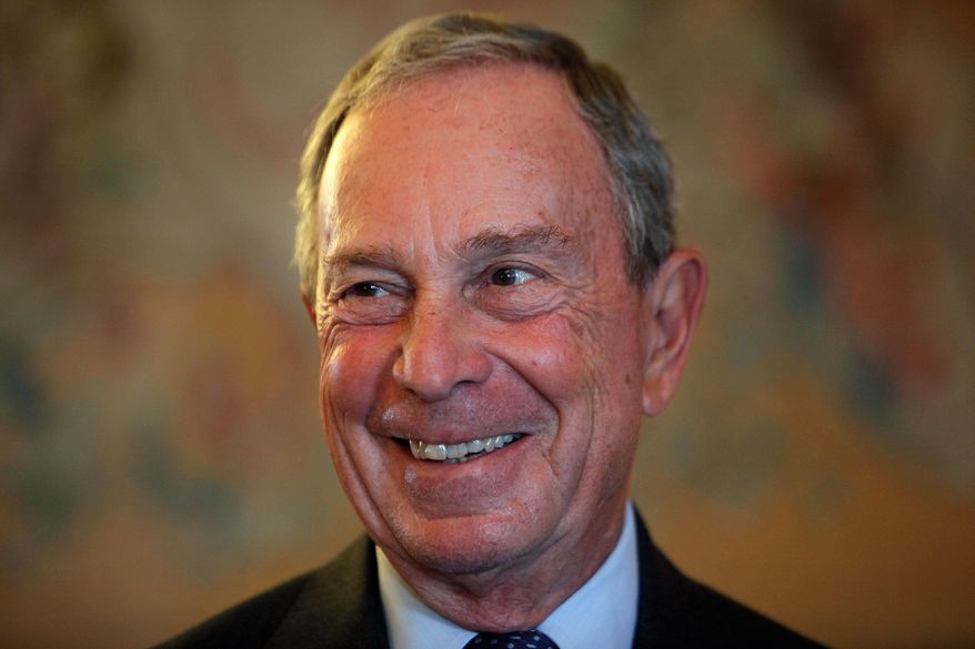 In this Sept. 16, 2014, file photo, former New York Mayor Michael Bloomberg smiles prior to be conferred with the Chevalier de la Legion d&#x27;Honneur by France&#x27;s Foreign minister Laurent Fabius, at the Quai d&#x27;Orsay, in Paris. (AP Photo/Thibault Camus, File)